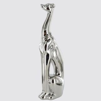 Greyhound Sitting by Silver Ceramics
